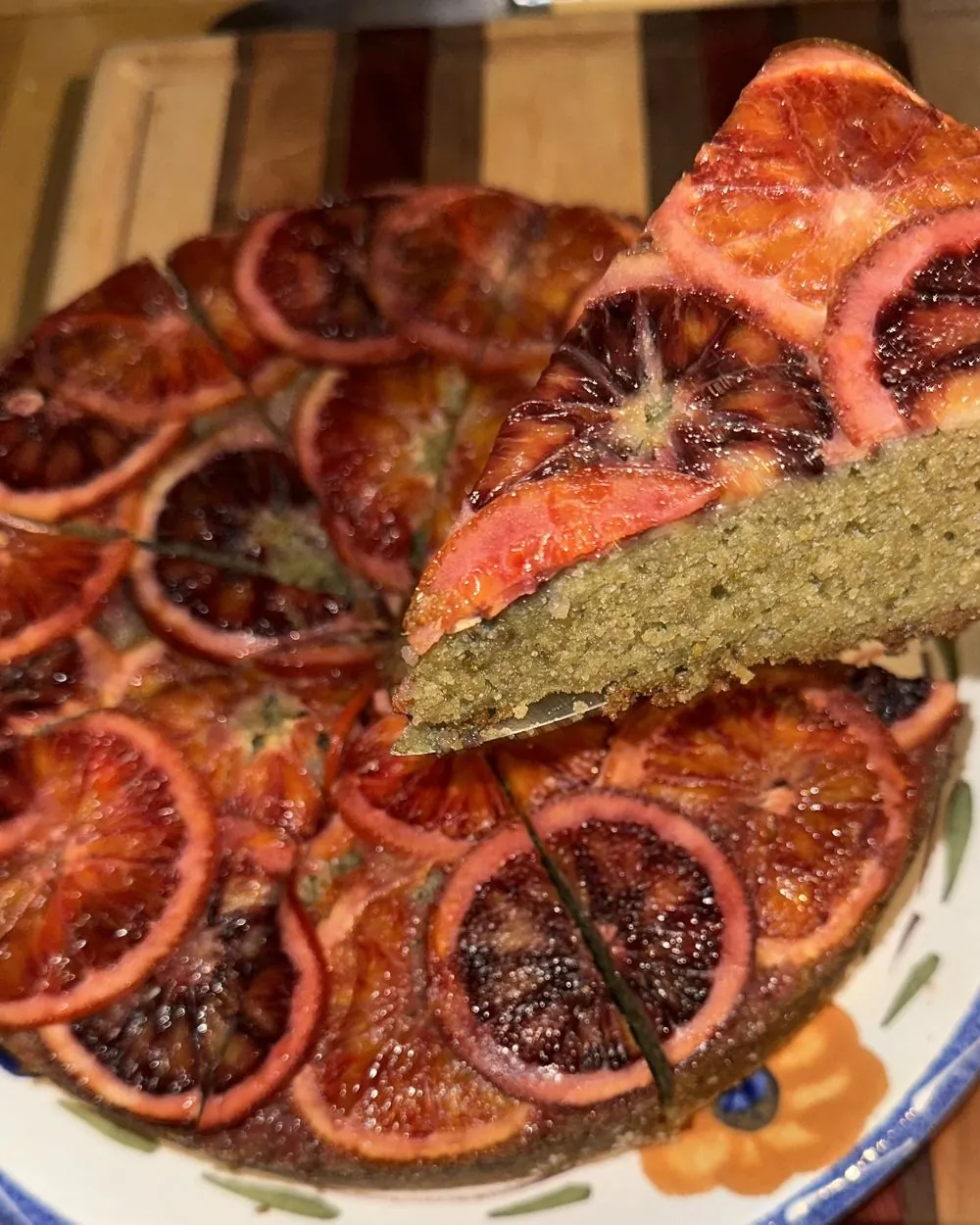 Blood orange upside down cake with a slice cut